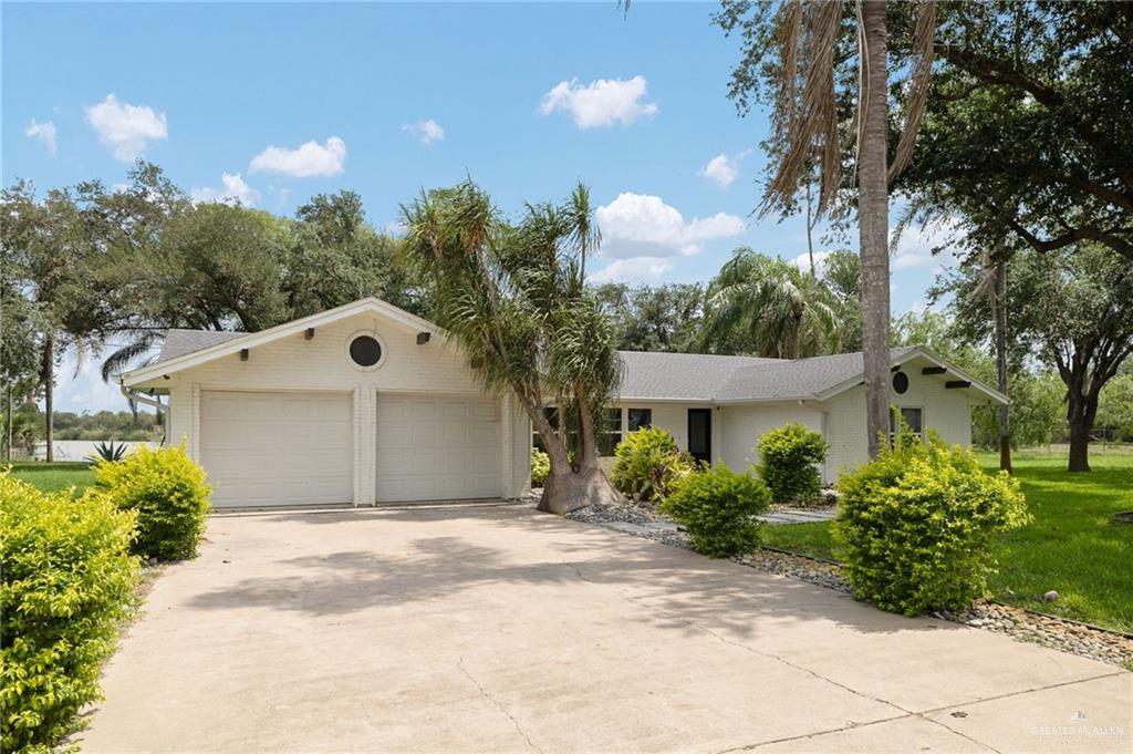 Single Family home at 1411 Moon Lake Drive, Weslaco, Texas